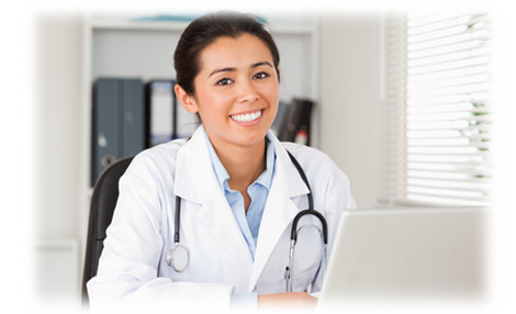 Doctor sitting at her computer
