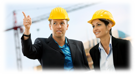 Two people in hardhats on a construction site