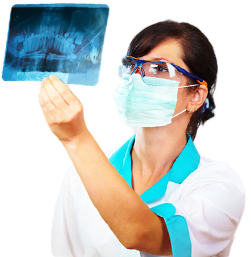 Female dentist examining an xray
