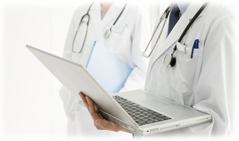 Doctors holding a laptop computer