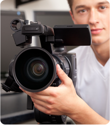 Man holding video camera